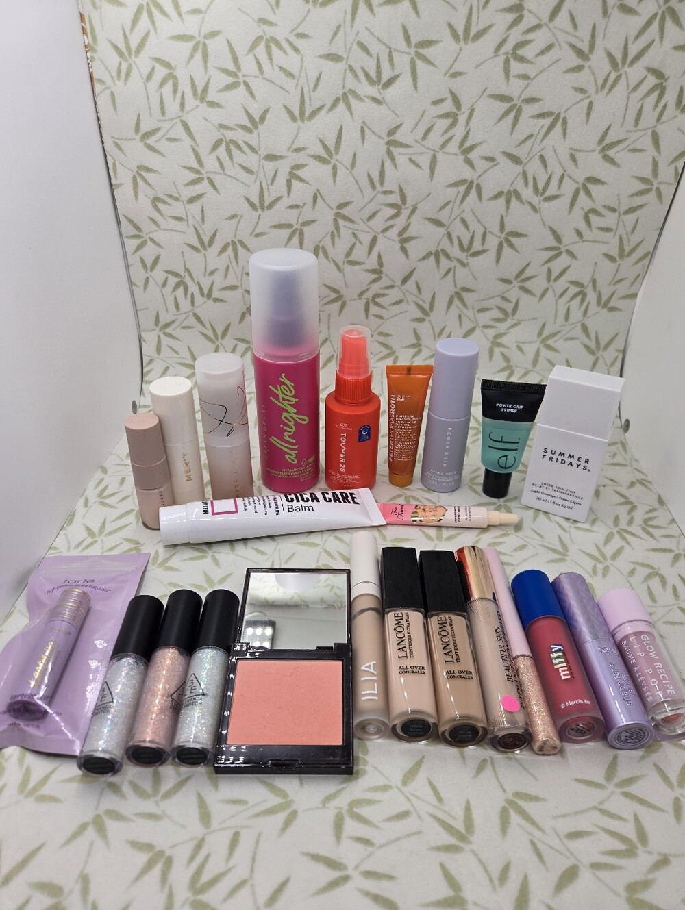 Set Of 25 Fenty Tint Sticks, Lancome Concealer, Laura Mercier Peach Cheek Color